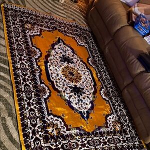 Elegant Gold and Black Area Rug